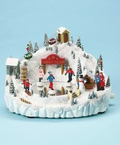 The Holiday Barn Skating Pond Music Box Christmas Music Boxes